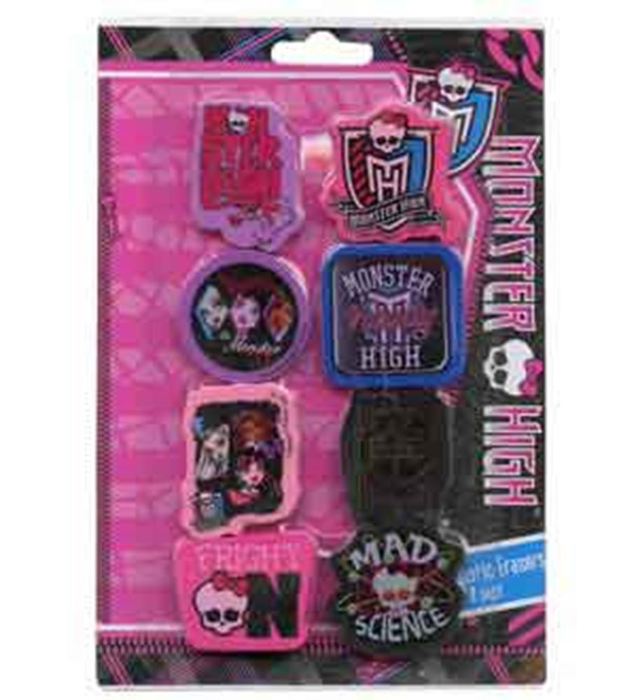 Eight colorful Monster High themed erasers in various shapes including characters, skulls, and logos, packaged on a pink.
