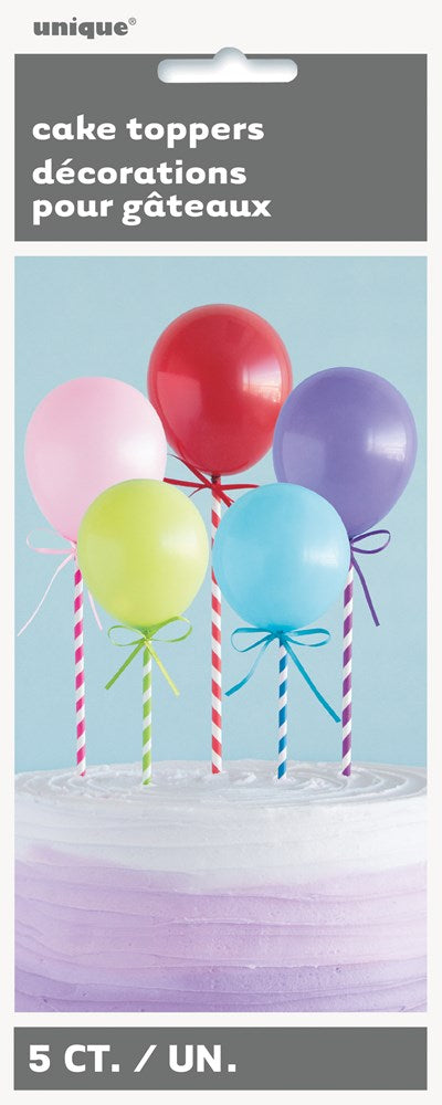 Five mini balloon cake toppers in bright colors—red, purple, pink, green, and blue—with striped white and colored sticks.