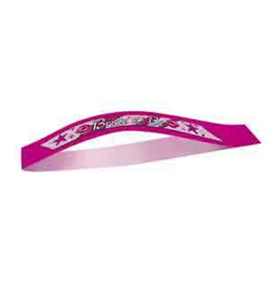 Hot pink satin sash with white panel reading "Bride To Be" in decorative script and floral accents.