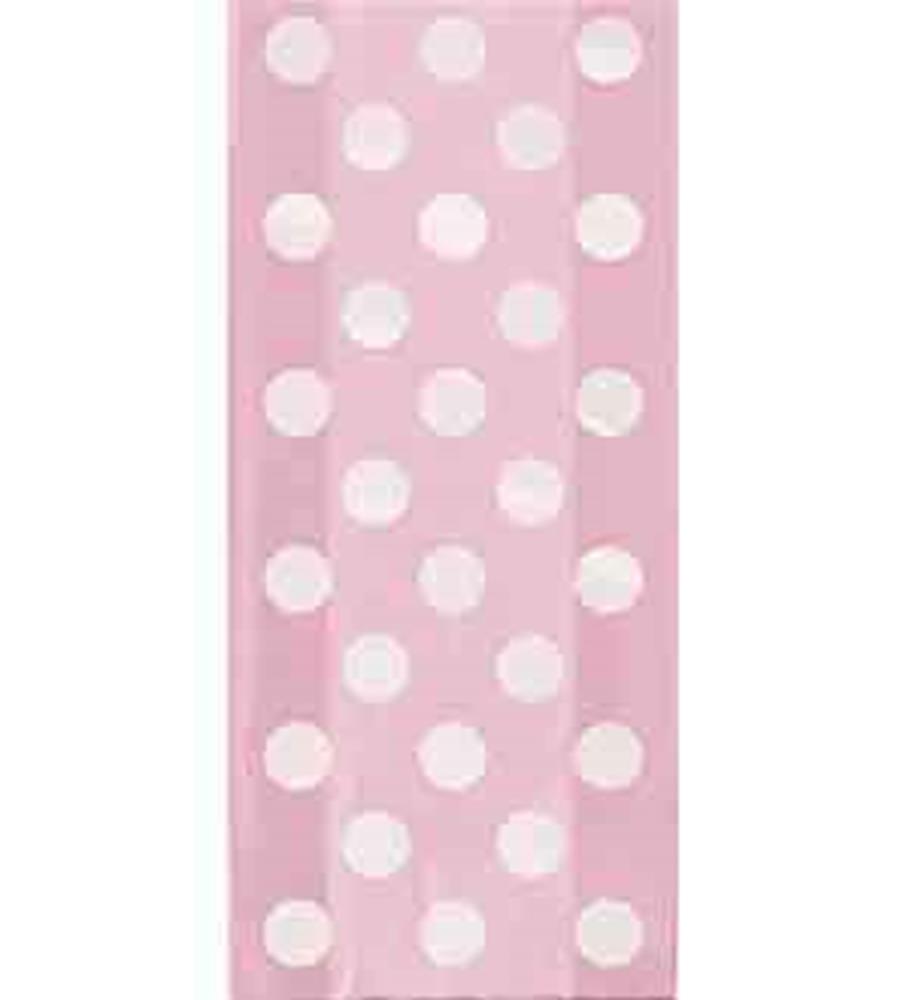 Pink cello bag with large white polka dots, rectangular shape, 5x11 inches.