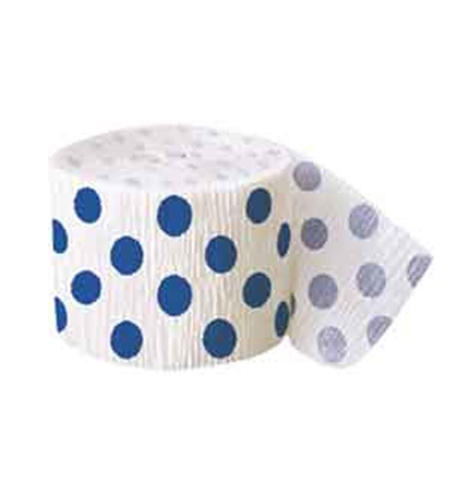 White crepe paper streamer with royal blue polka dots, partially unrolled on white background.
