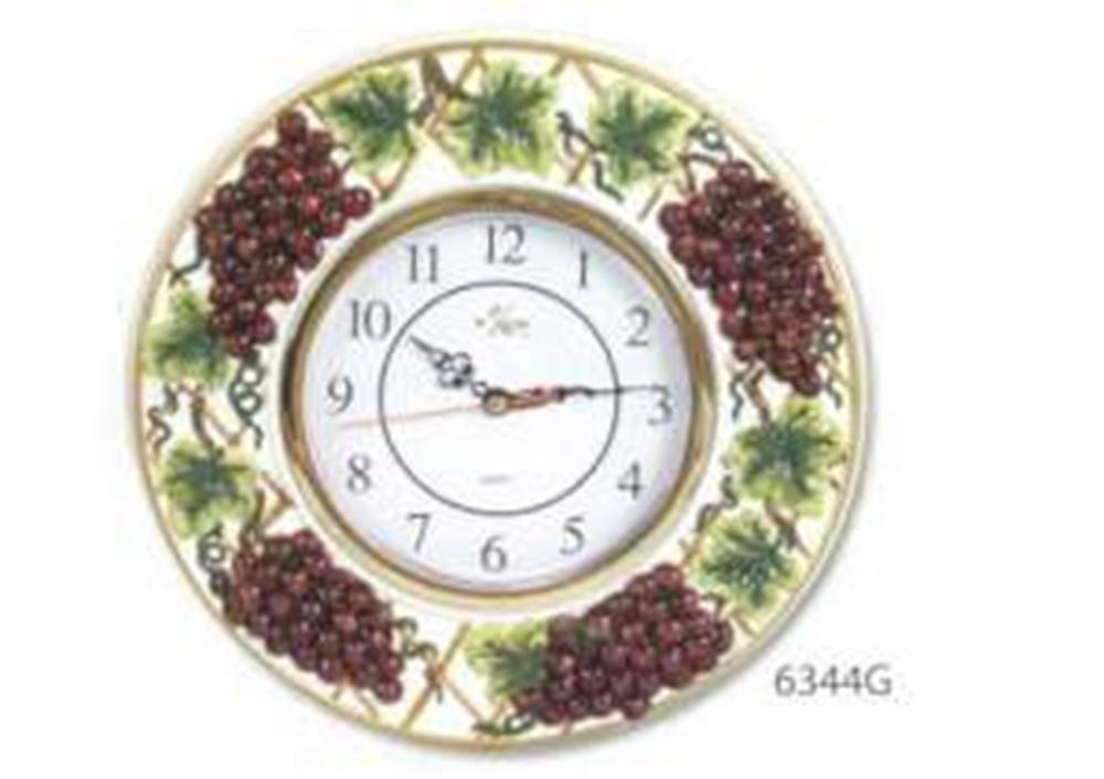 Round wall clock with white face, black numbers, and grapevine illustration on ceramic frame.