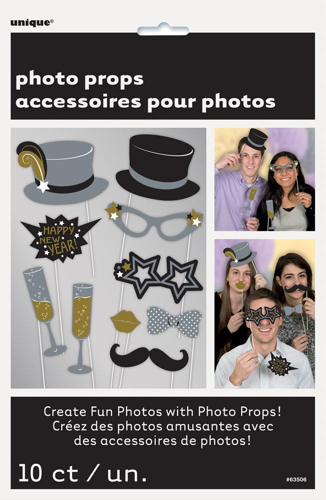 Set of 10 New Year’s photo props including gray and black top hats, star-shaped glasses, speech bubbles, champagne flutes,.