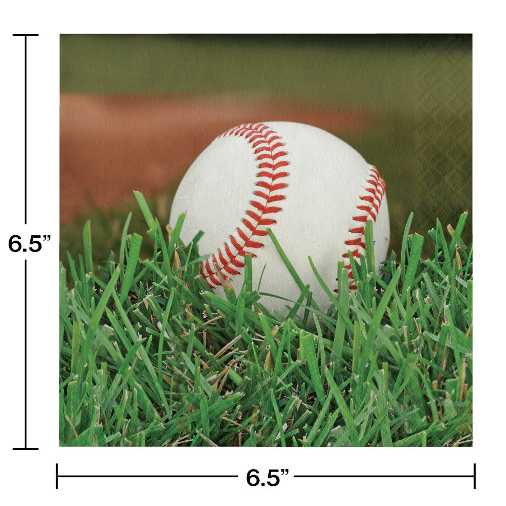 Square napkin with a close-up of a white baseball on green grass and a blurred brown glove background.