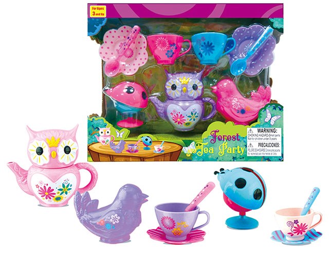 Colorful plastic tea set with owl teapot, cups, spoons, and bird-shaped pieces in pink, purple, and blue.