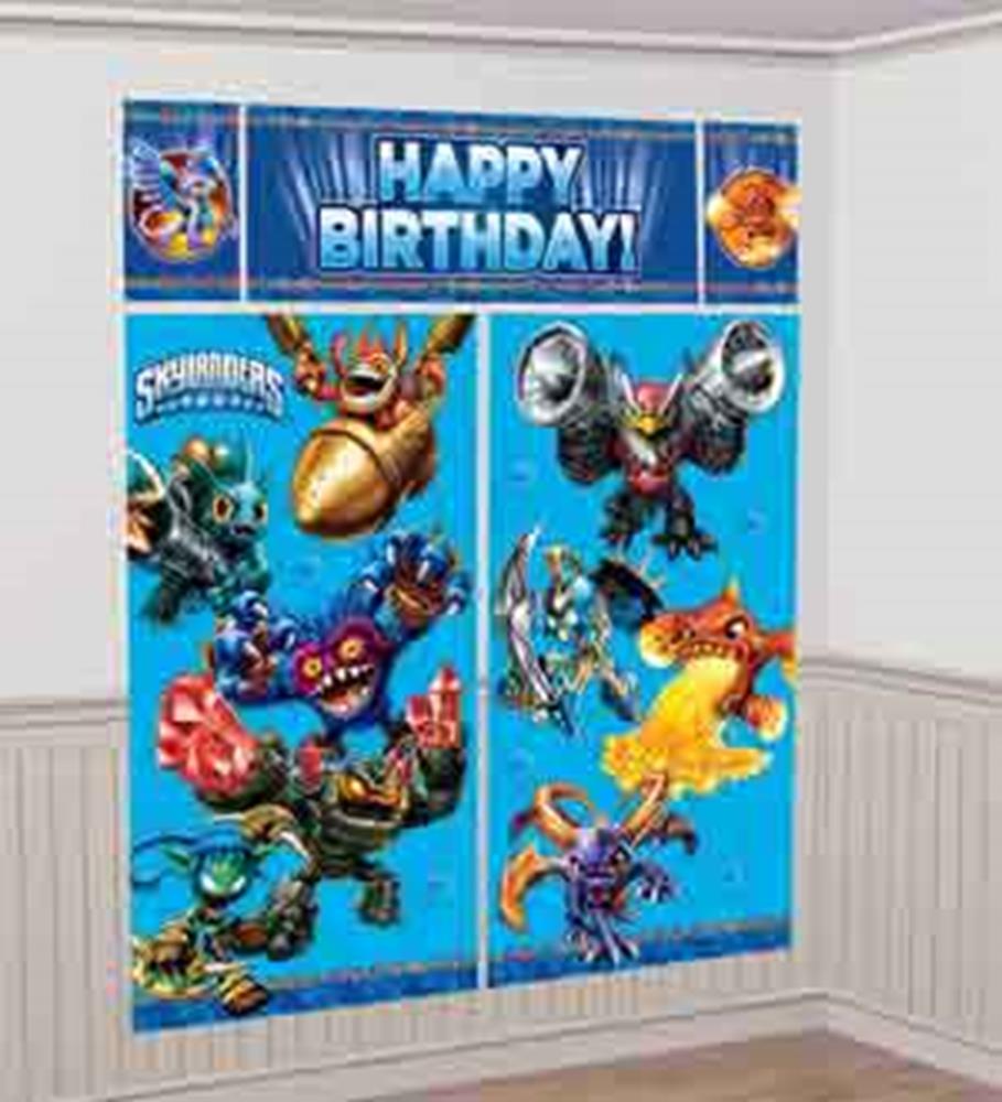 Bright blue Skylanders-themed birthday scene setter with colorful animated characters and "Happy Birthday!" text.