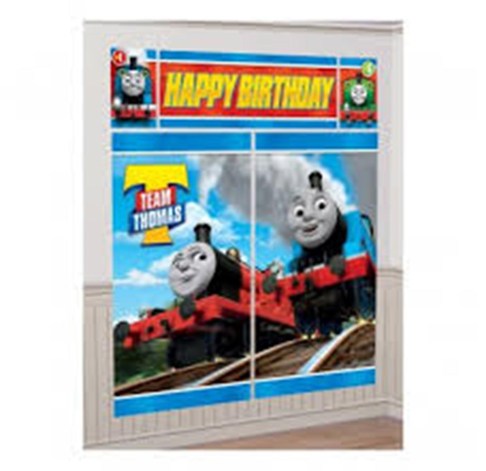 Blue and red Thomas the Tank Engine wall decoration with "Happy Birthday" banner and "Team Thomas" text.