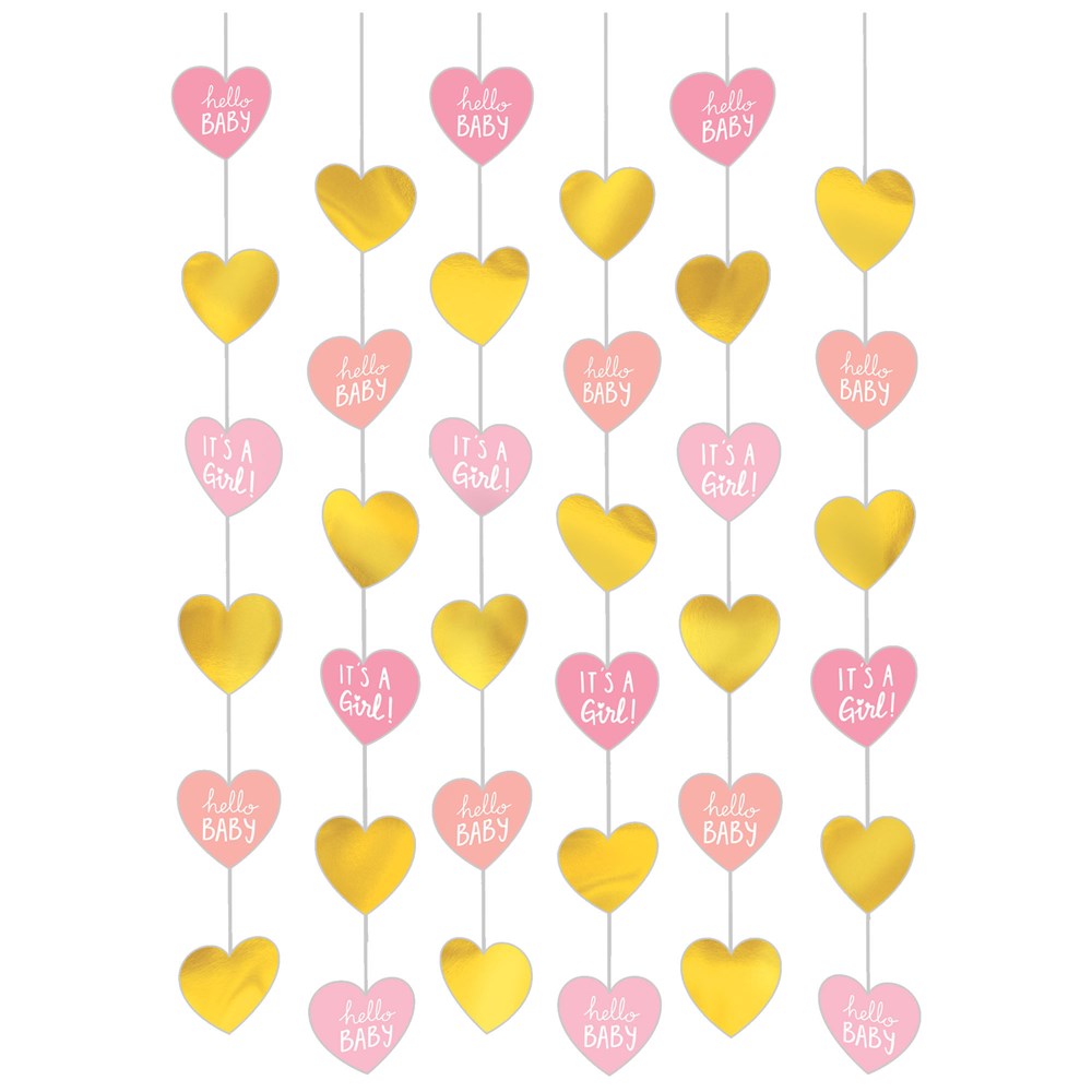 Six hanging strings with alternating pink heart-shaped and gold heart-shaped paper decorations, pink hearts reading "It's a.
