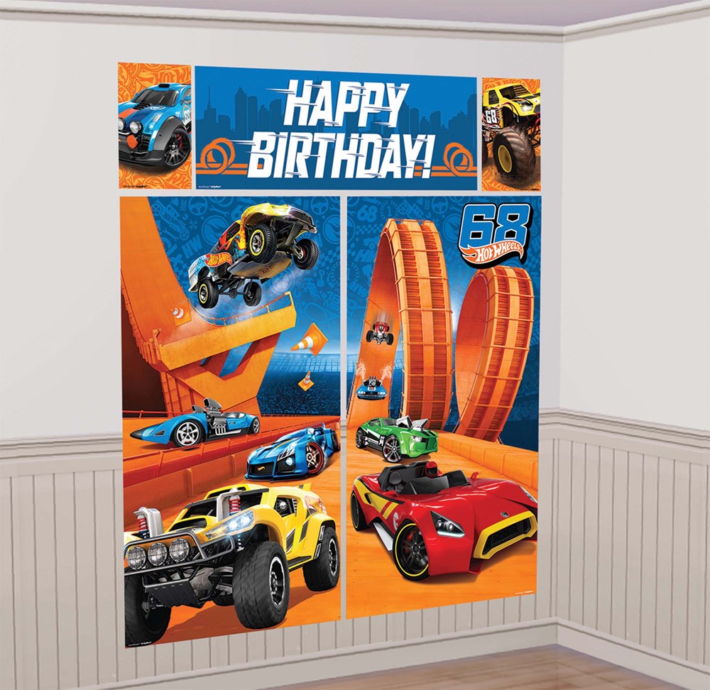 Colorful Hot Wheels wall decals featuring racing cars, loops, and "Happy Birthday" text in blue and orange tones.