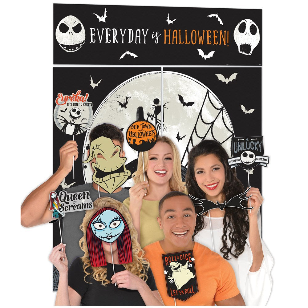 Disney Tim Burton's Nightmare Before Christmas scene setter with black, white, and orange photo props featuring characters.