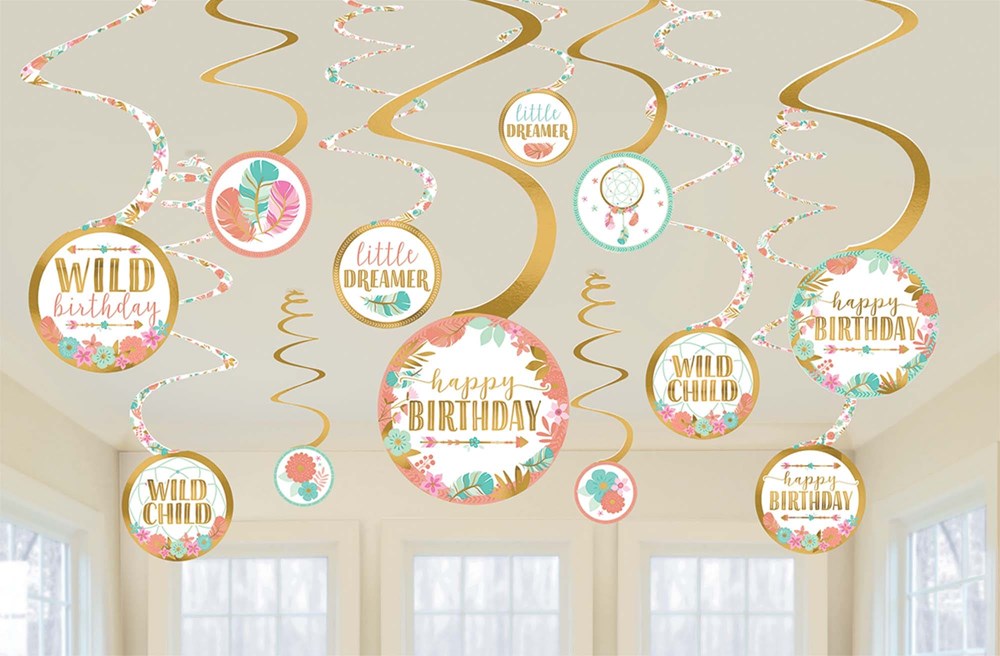 Colorful hanging swirl decorations with circular birthday-themed designs in pastel pink, teal, gold, and white for girls'.