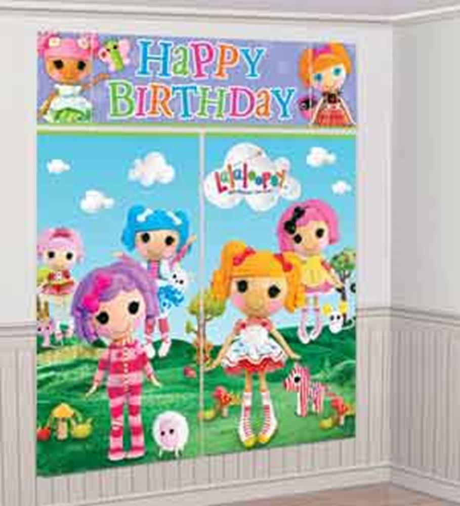 Colorful Lalaloopsy-themed birthday scene setter with dolls, animals, balloons, and "Happy Birthday" banner on a bright blue