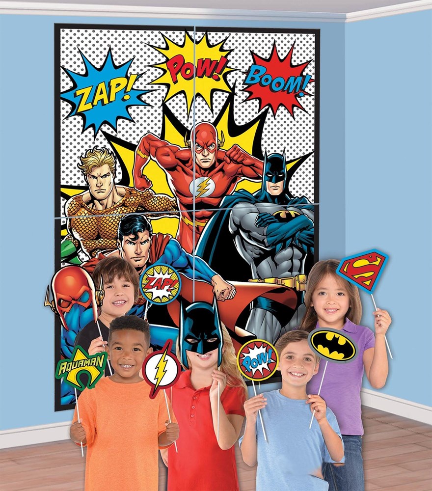 Colorful Justice League scene setter with superhero cutouts and comic-style "Zap," "Pow," and "Boom" speech bubbles.
