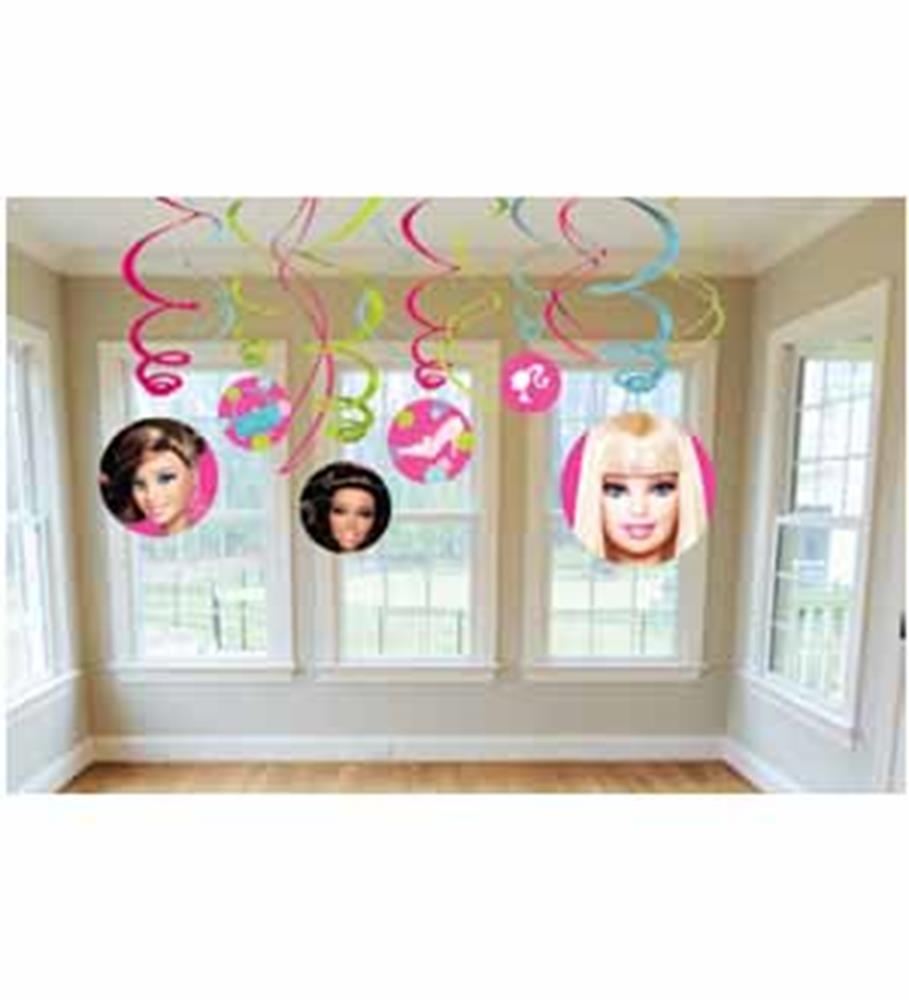 Colorful hanging swirl decorations with Barbie doll faces for party décor.
