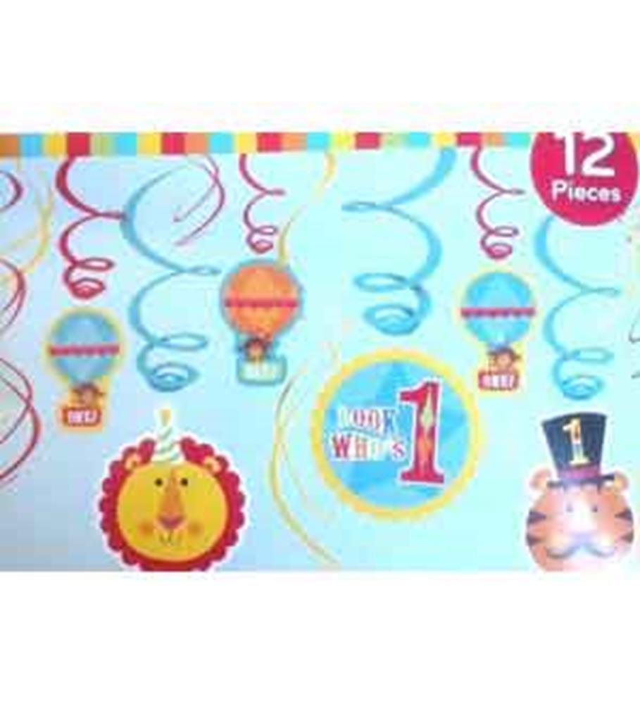 Colorful balloon and swirl hanging decorations with a lion, a bear wearing a top hat, and "One Year Old" text for a 1st.