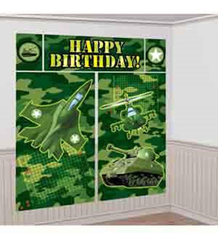 Green camouflage scene setter with military aircraft, helicopter, tank, and "Happy Birthday" text in yellow.