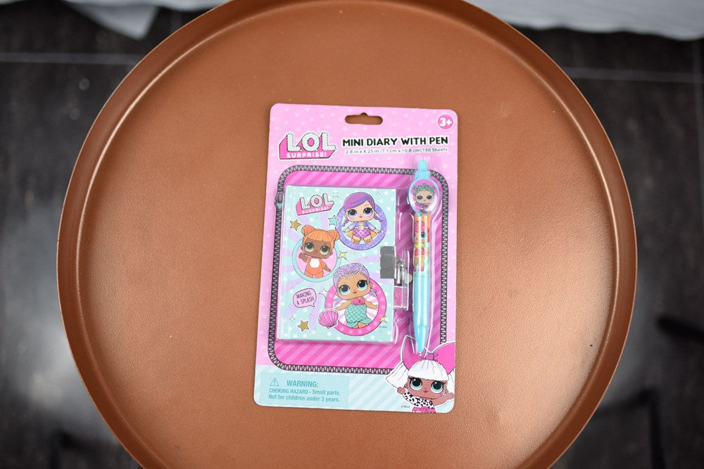 Pink LOL Surprise diary with cartoon doll covers and matching pen in blister packaging.