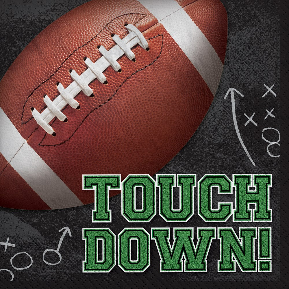 Stack of rectangular luncheon napkins with a large brown football, white laces, and green "TOUCH DOWN!" text on a dark gray.