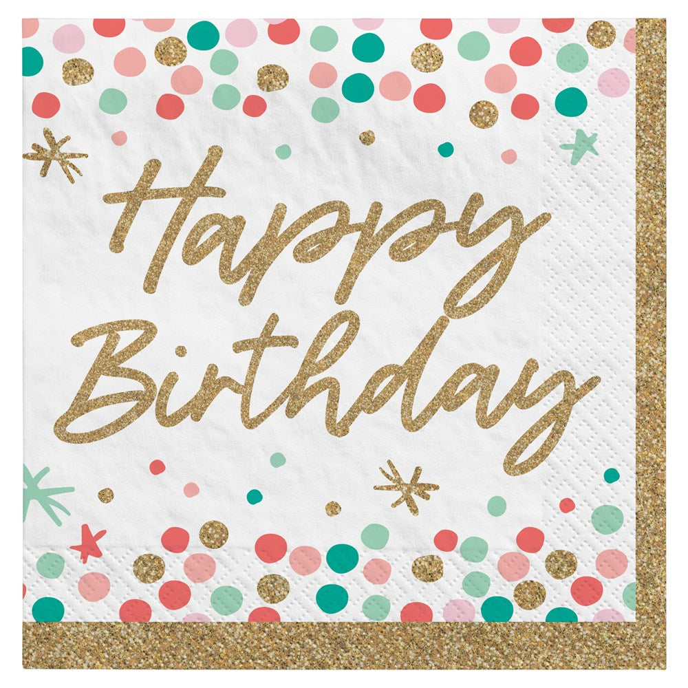 White square luncheon napkin with gold glitter "Happy Birthday" text and colorful confetti dots and stars border.