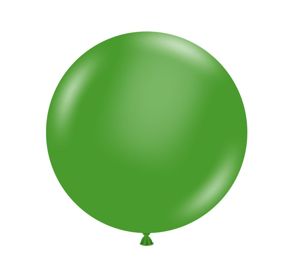 Large round green latex balloon with a smooth surface and tied end.