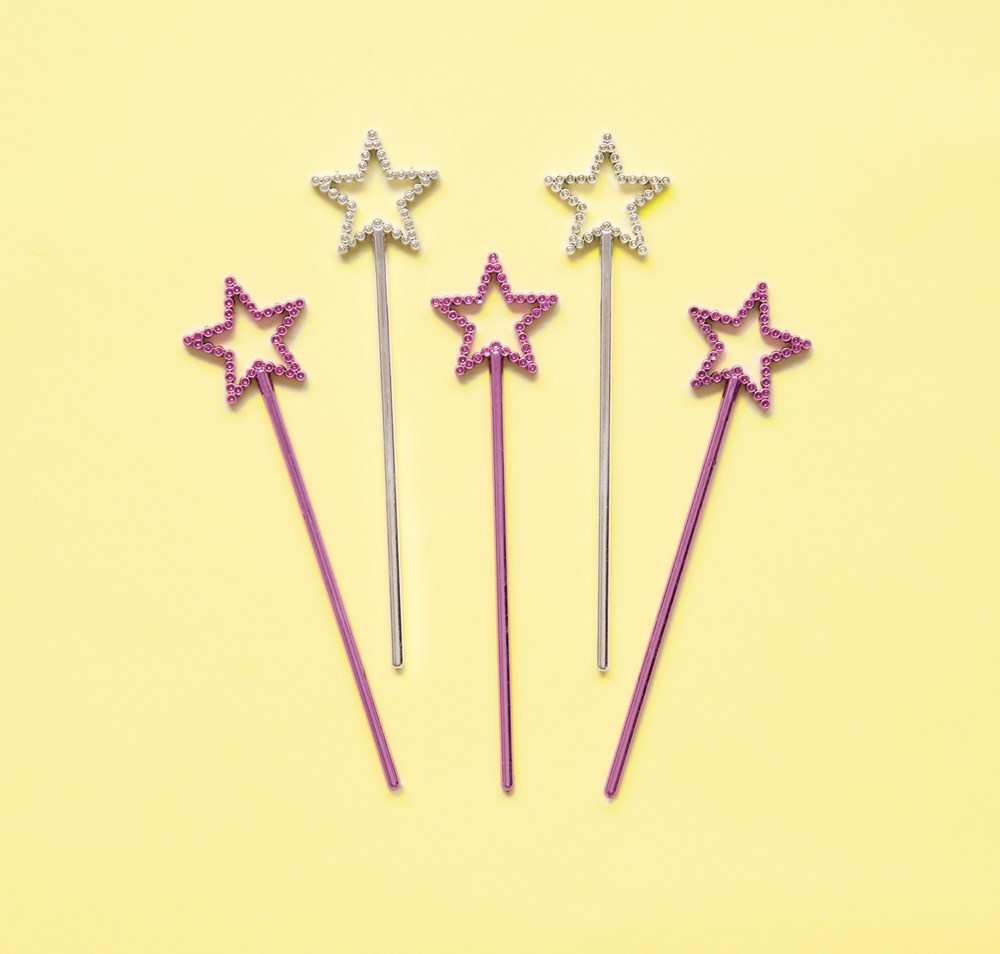 Eight mini star-shaped wands with glittery pink and silver star tops on thin handles against a yellow background.