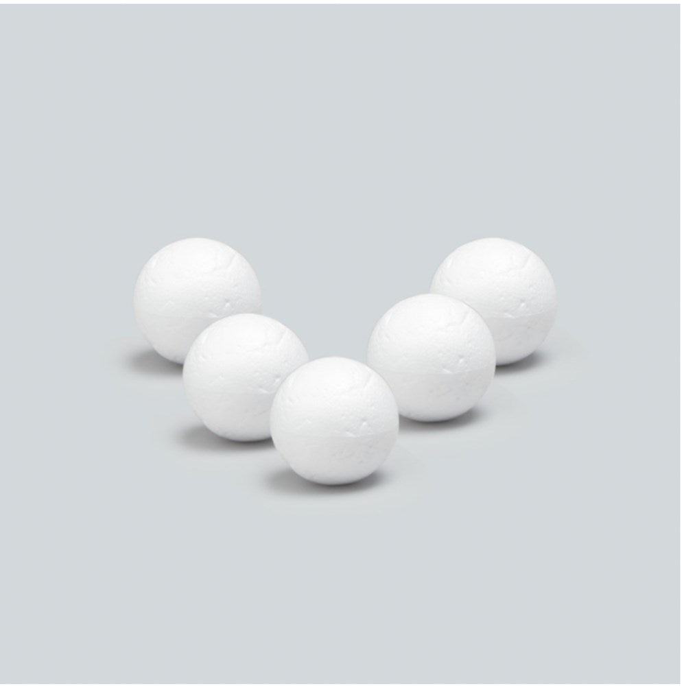 Twelve white smooth styrofoam balls, 2 inches in diameter, arranged loosely on a gray surface.