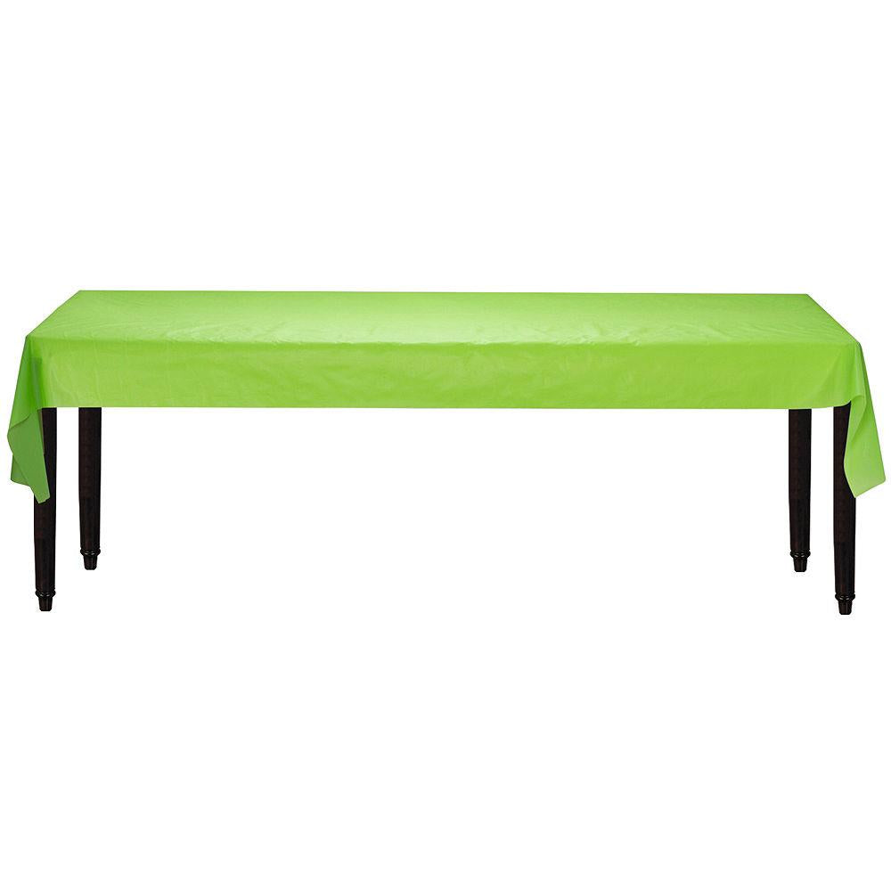 Bright kiwi green rectangular tablecloth draped over dark wooden table.
