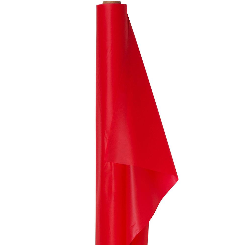 Bright apple red smooth roll of tableroll paper partially unrolled upright.