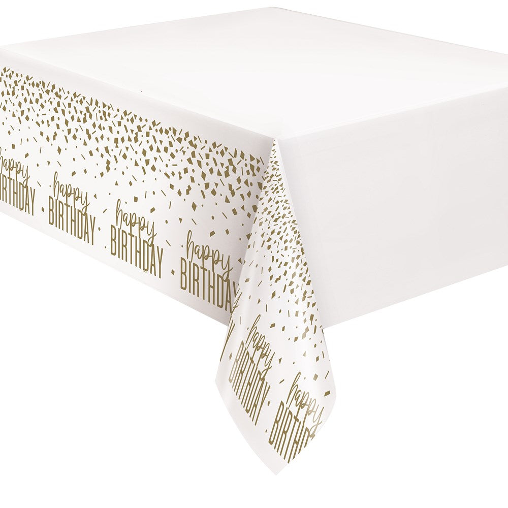 White plastic tablecover with gold confetti and "Happy Birthday" text along the edges.