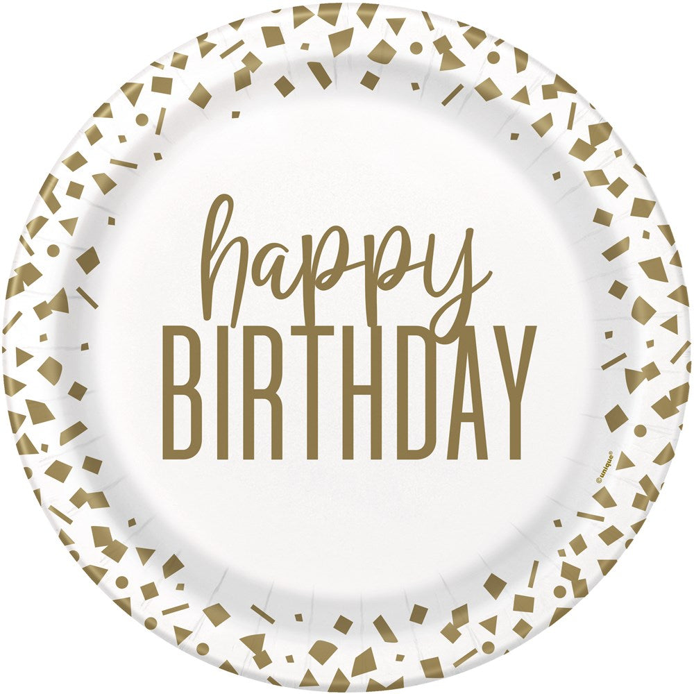 White 9-inch round paper plate with gold confetti border and "happy BIRTHDAY" text in gold cursive and bold letters.