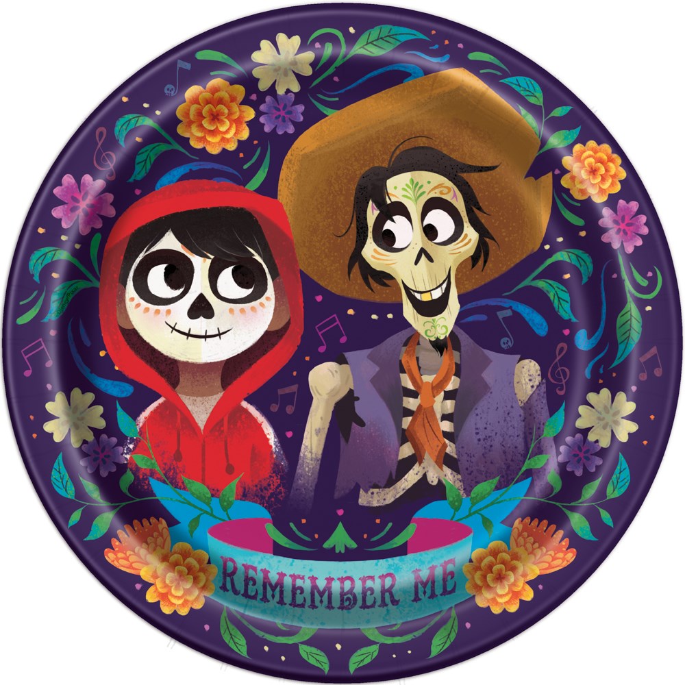 Round purple plate featuring animated skeleton characters from Disney's Coco surrounded by colorful flowers and the phrase.