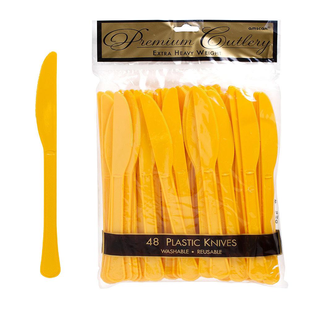 Set of 48 bright yellow plastic knives with serrated edges, lightweight and reusable.