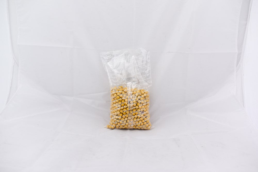 Clear plastic bag filled halfway with shiny gold metallic bead strands, small round beads packed inside.