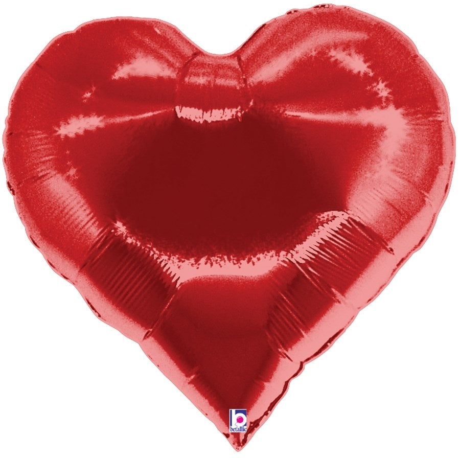 Shiny red foil balloon shaped like a heart with a smooth, reflective surface.