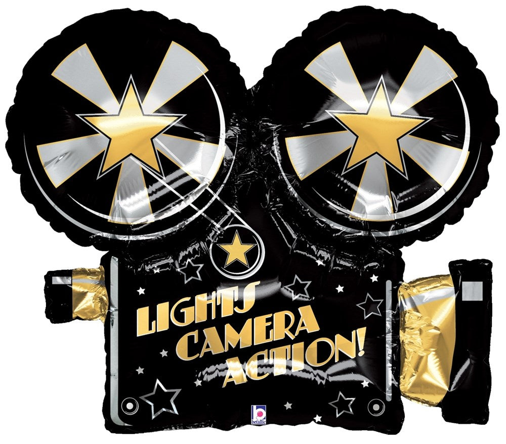 Black and gold foil balloon shaped like a vintage movie camera with "Lights Camera Action!" text and star designs.