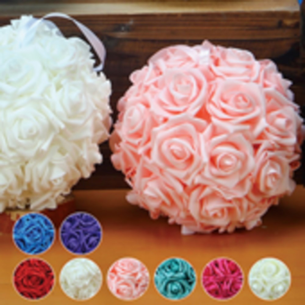 White foam rose ball with tightly clustered detailed petals, spherical decorative floral arrangement.
