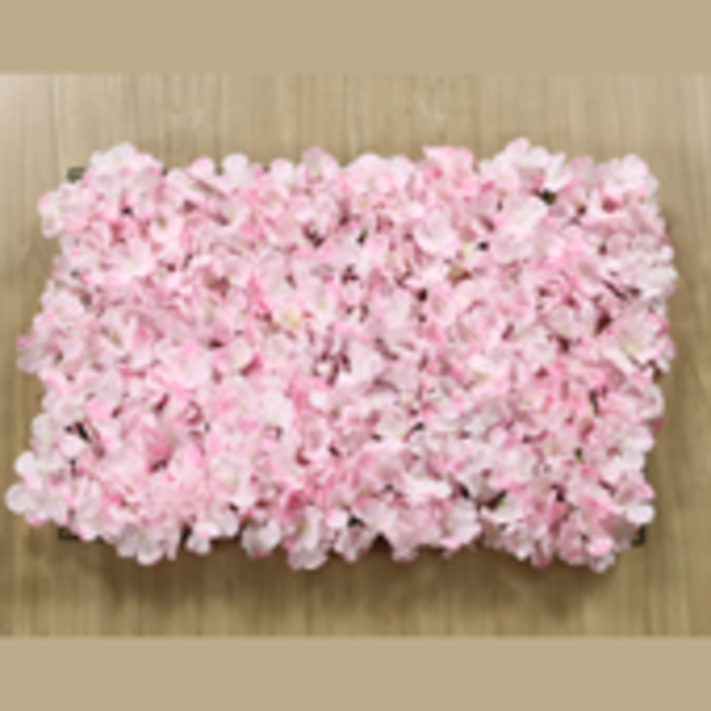Rectangular panel of dense pink hydrangea flowers with light green accents on a wooden background.