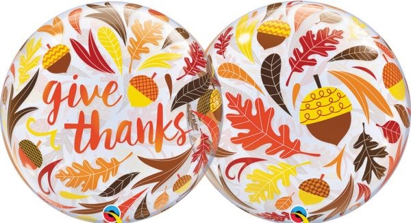22-inch round clear balloon with colorful acorns, autumn leaves, and "give thanks" text in orange cursive.