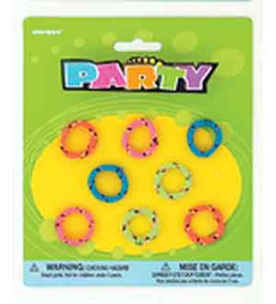 Set of eight colorful plastic friendship rings in bright pink, blue, and yellow on party-themed card backing.
