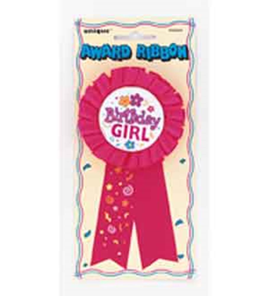 Pink birthday girl award ribbon with decorative confetti designs on tails.