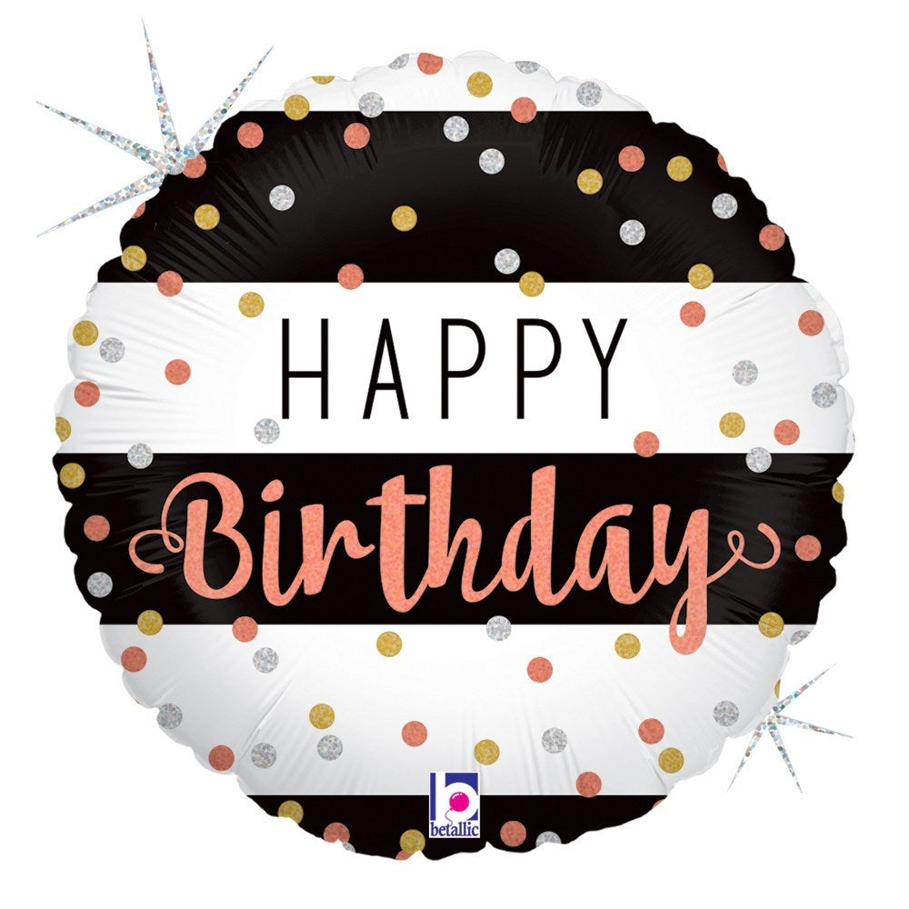 Round holographic foil balloon with rose gold, black, and white polka dots, stripes, and "Happy Birthday" text.