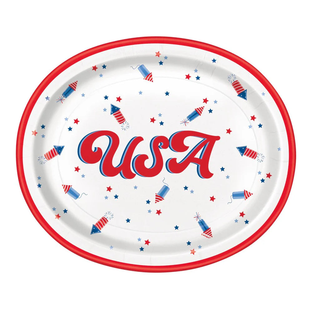 Oval white plate with red rim, featuring "USA" in red and blue script, decorated with red, white, and blue fireworks and.