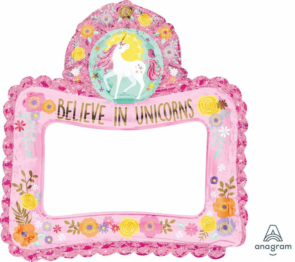 Pink selfie frame with scalloped edges, decorated with yellow and orange flowers and a white unicorn illustration on top,.