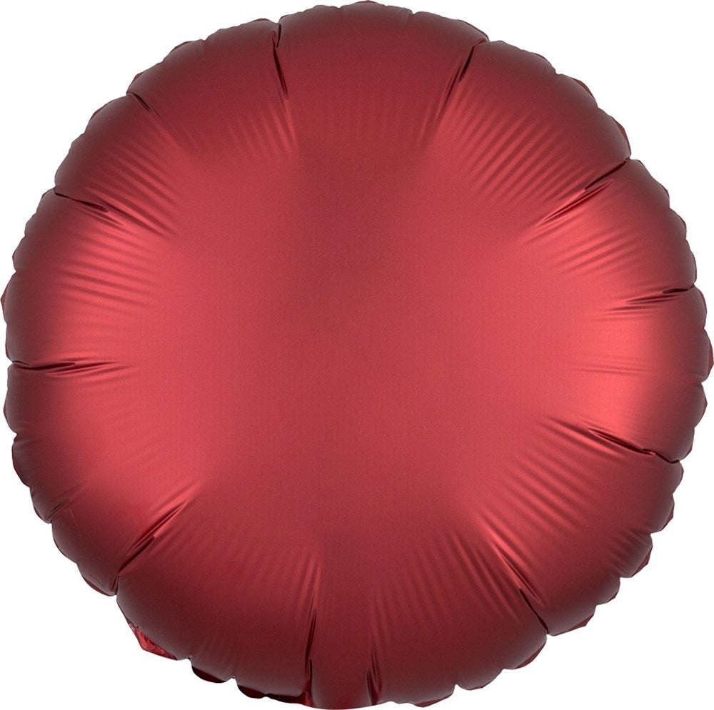 Round 17-inch foil balloon in deep sangria red with a satin finish, flat and smooth surface.