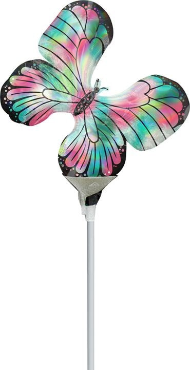 Iridescent teal and pink butterfly-shaped foil balloon with detailed wing patterns and a flat base attached to a white stick.