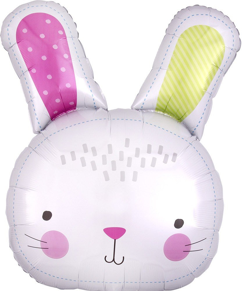 White foil balloon shaped like a bunny face with pink and yellow polka-dot ears and rosy cheeks.