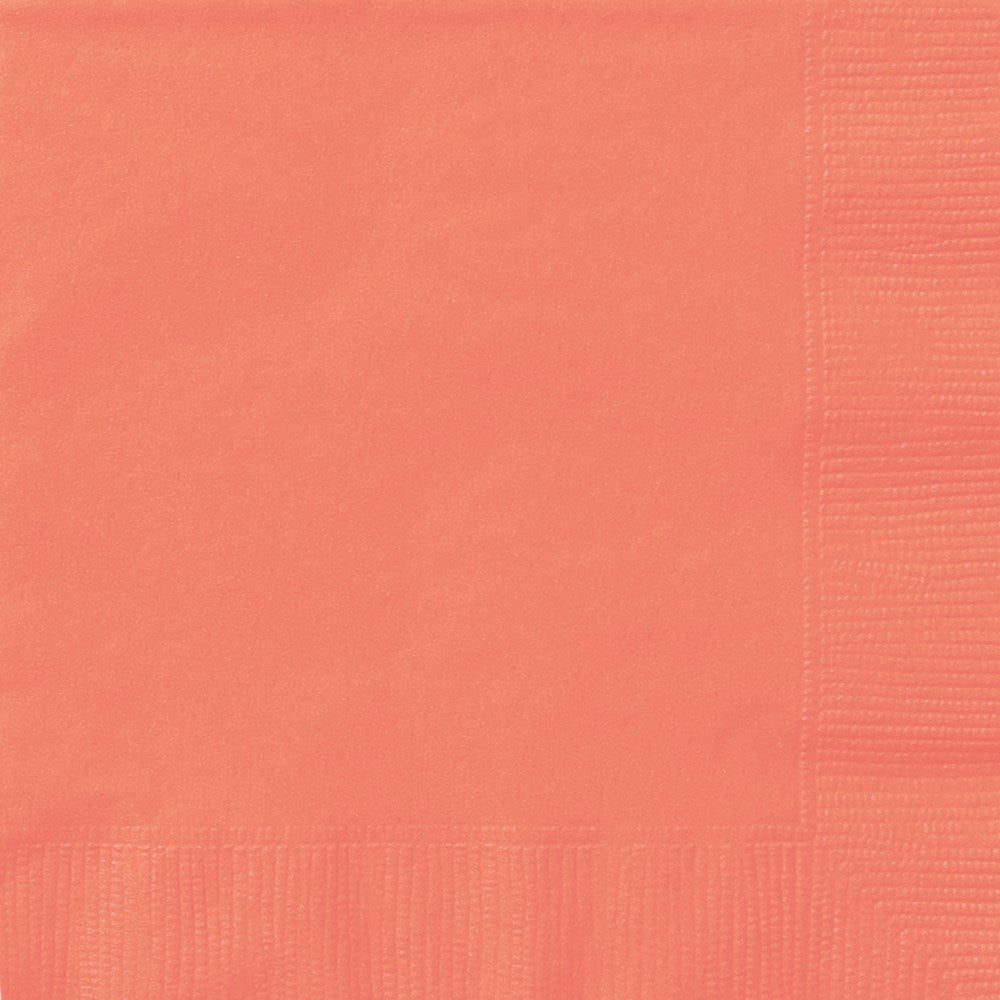 Stack of small coral-colored paper napkins with embossed border design.