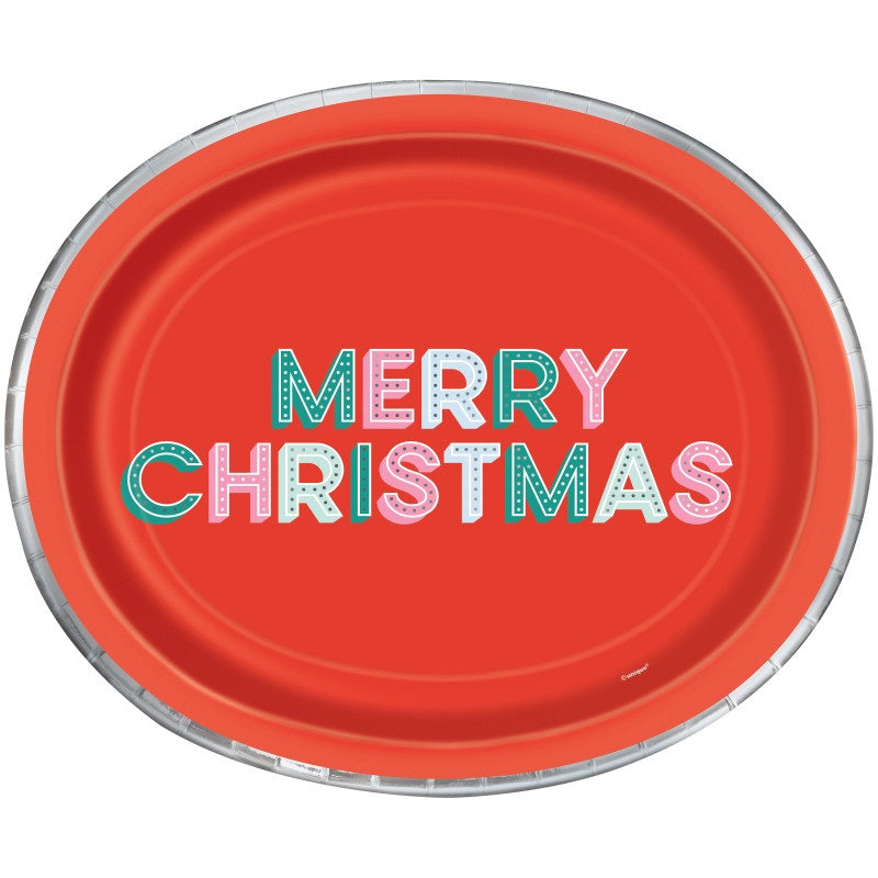 Red oval disposable plate with colorful "Merry Christmas" text in mixed patterns and silver trim.