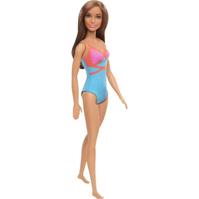 Barbie doll with long brown hair wearing a pink and blue cutout one-piece swimsuit.