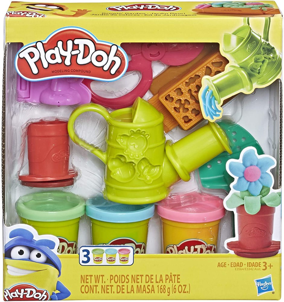 Play-Doh Grown Garden Set with green watering can, flower-shaped mold, and four colorful Play-Doh cans in yellow, blue,.